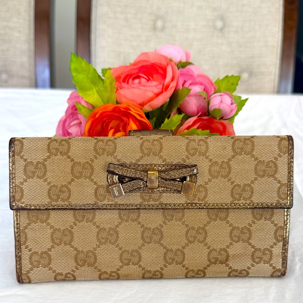 Authentic Gucci Golf Monogram Wallet with Bow Accent